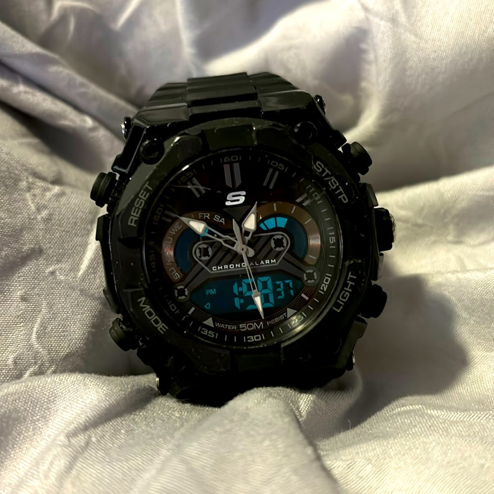 Black Sketchers Watch